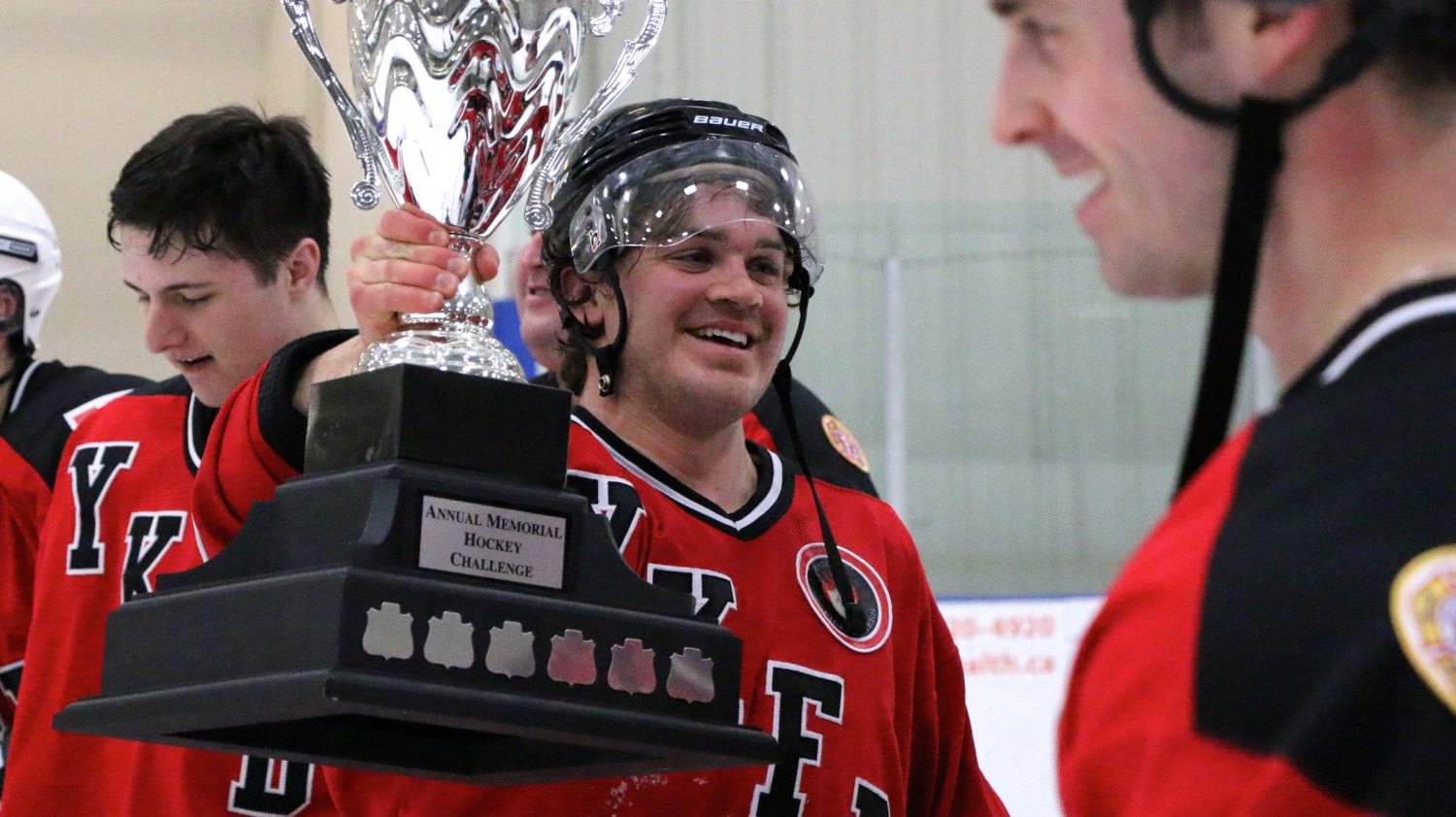 Pete Mercredi with Memorial Hockey Challenge Trophy