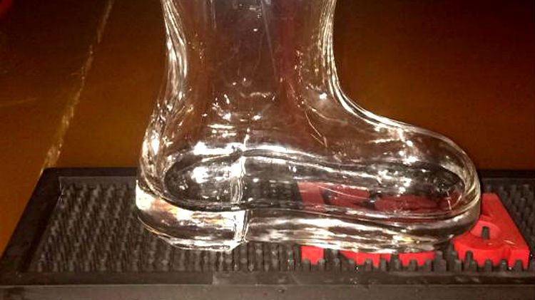 Coyote's boot-shaped glass