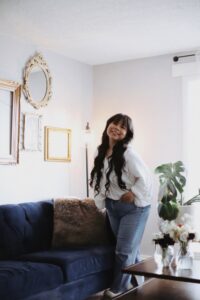 Woman standing and smiling